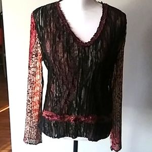 Alberto makali of New York Paris and Milan blouse